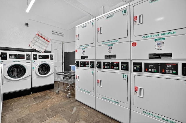 355 Bronx River Rd Unit 4B, Yonkers, NY 10704 - community laundry room featuring stacked washing machine and dryer, independent washer and dryer, and stone finish floors