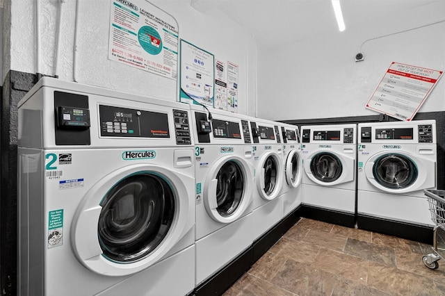 355 Bronx River Rd Unit 4B, Yonkers, NY 10704 - community laundry featuring independent washer and dryer and stone finish flooring