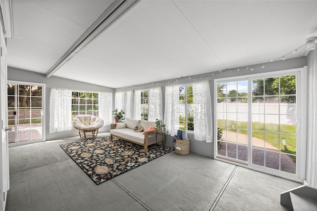 16 Melvin Ave, Farmingville, NY 11738 - sunroom featuring carpet flooring, vaulted ceiling, and plenty of natural light
