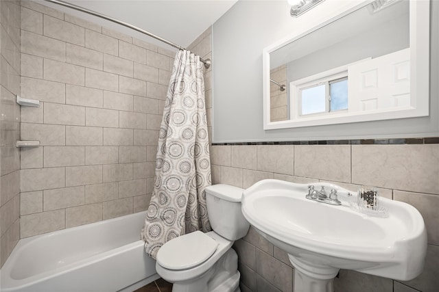 16 Melvin Ave, Farmingville, NY 11738 - bathroom featuring shower / bath combination with curtain, tile walls, and wainscoting