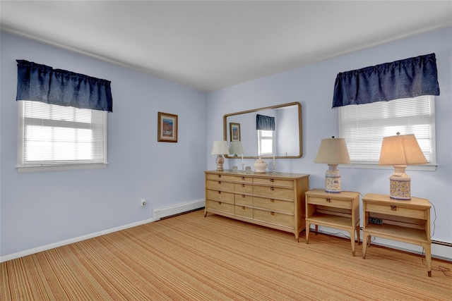 138 Sequams Ln E, West Islip, NY 11795 - living area with baseboard heating and baseboards