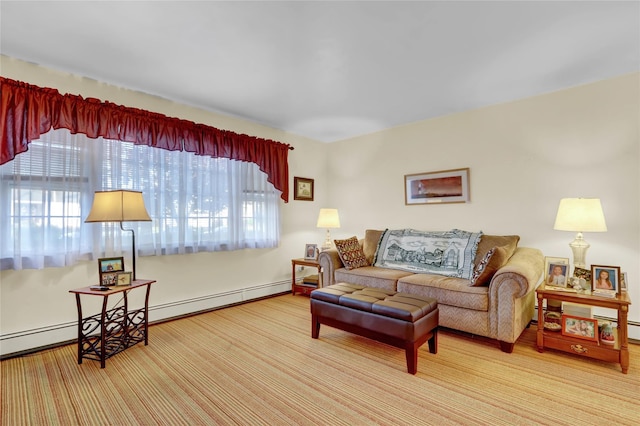 138 Sequams Ln E, West Islip, NY 11795 - living area featuring a baseboard radiator and baseboards