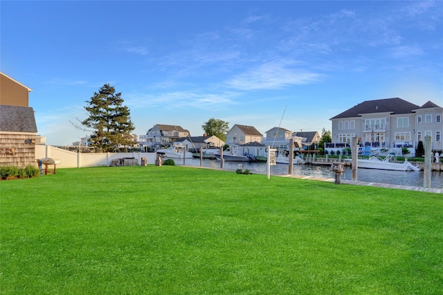 138 Sequams Ln E, West Islip, NY 11795 - view of yard with a water view, a residential view, and a dock