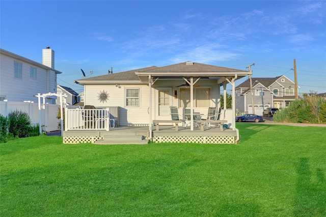 138 Sequams Ln E, West Islip, NY 11795 - rear view of property with a deck and a shingled roof