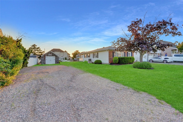 138 Sequams Ln E, West Islip, NY 11795 - view of front of house featuring a front yard, gravel driveway, a residential view, and brick siding