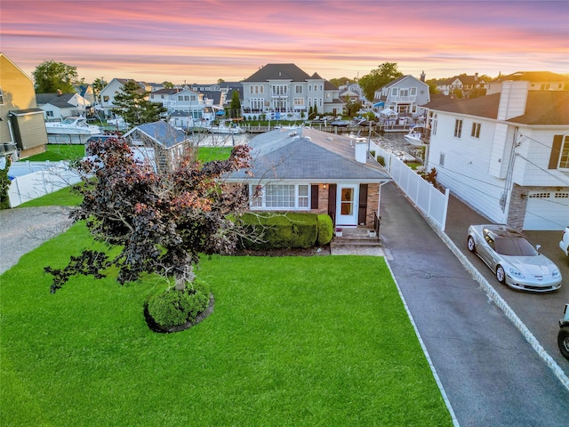 138 Sequams Ln E, West Islip, NY 11795 - ranch-style home with a residential view and driveway