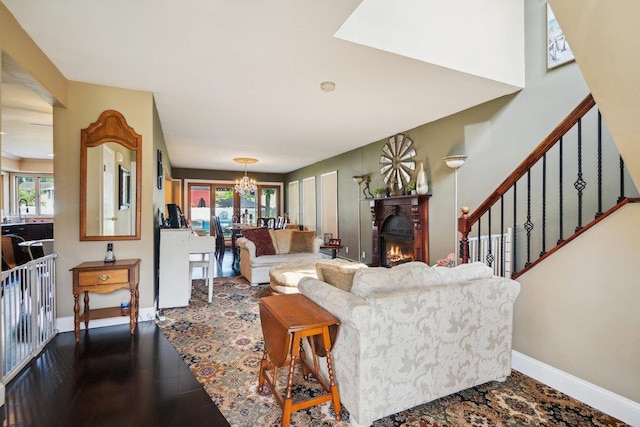 17 Sterling Dr, Lake Grove, NY 11755 - living room with plenty of natural light, a chandelier, stairway, and dark wood-style flooring
