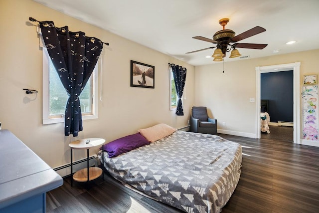 17 Sterling Dr, Lake Grove, NY 11755 - bedroom with a baseboard radiator, wood finished floors, recessed lighting, a baseboard heating unit, and a ceiling fan