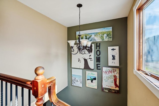 17 Sterling Dr, Lake Grove, NY 11755 - stairs with a chandelier