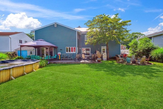 17 Sterling Dr, Lake Grove, NY 11755 - back of house with a gazebo, a yard, and a wooden deck
