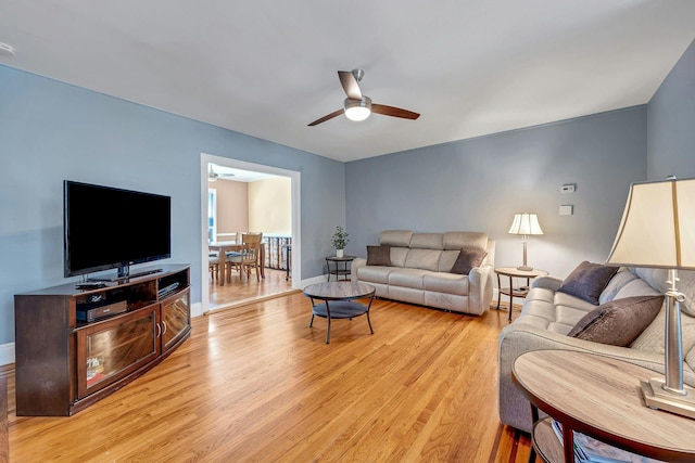 2524 Mickle Ave, Bronx, NY 10469 - living room with ceiling fan and light wood-type flooring