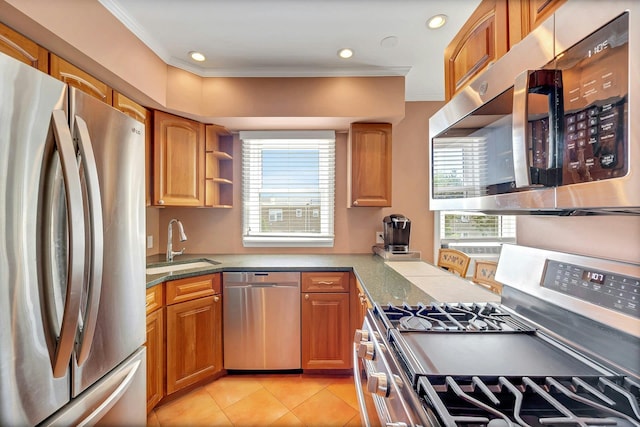 2524 Mickle Ave, Bronx, NY 10469 - kitchen with appliances with stainless steel finishes, light tile patterned floors, ornamental molding, brown cabinetry, and recessed lighting
