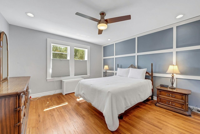 2524 Mickle Ave, Bronx, NY 10469 - bedroom featuring radiator heating unit, light wood-type flooring, recessed lighting, and a ceiling fan