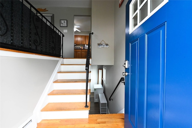 184 Sumpwams Ave, Babylon, NY 11702 - foyer featuring stairway, wood finished floors, and ceiling fan
