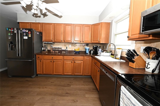 184 Sumpwams Ave, Babylon, NY 11702 - kitchen featuring stainless steel appliances, a ceiling fan, tasteful backsplash, and dark countertops