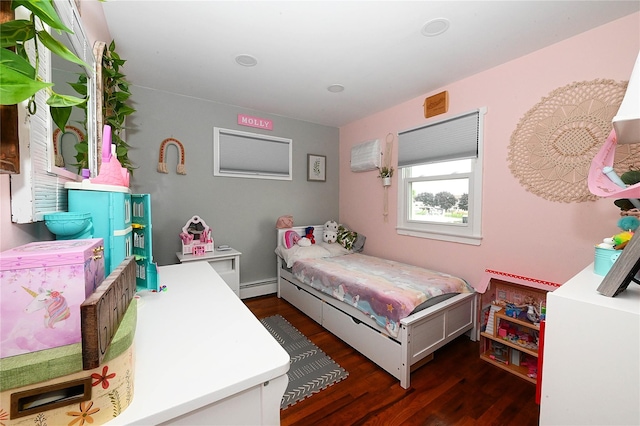 184 Sumpwams Ave, Babylon, NY 11702 - bedroom with a baseboard heating unit and wood finished floors