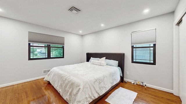 17 Arthur Pl, Yonkers, NY 10701 - bedroom featuring multiple windows, wood finished floors, and recessed lighting