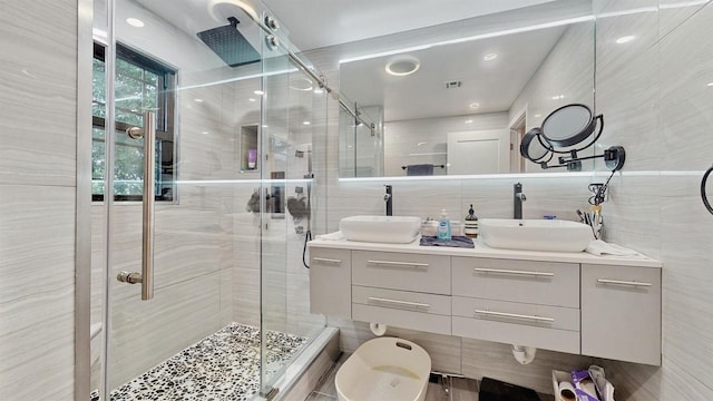 17 Arthur Pl, Yonkers, NY 10701 - bathroom with tile walls, a stall shower, and double vanity