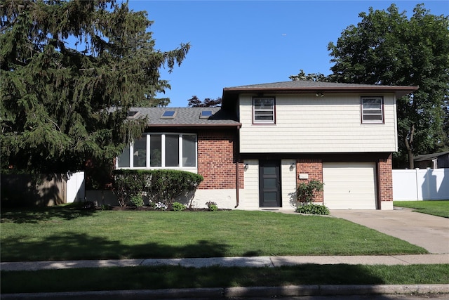19 Edna Dr, Syosset, NY 11791 - tri-level home with brick siding, driveway, and a garage