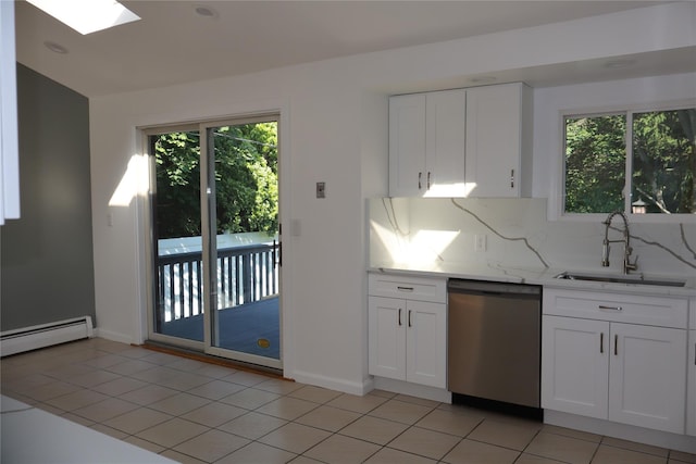 19 Edna Dr, Syosset, NY 11791 - kitchen with dishwasher, a baseboard heating unit, tasteful backsplash, white cabinets, and light tile patterned floors