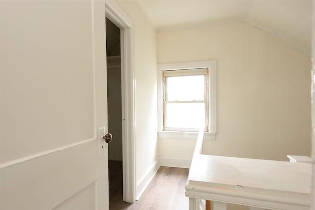 24 Parsons Dr, Hempstead, NY 11550 - hallway with light wood-style floors and ornamental molding