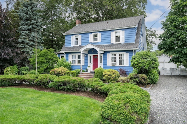3665 Lufberry Ave, Wantagh, NY 11793 - colonial inspired home with a chimney and roof with shingles