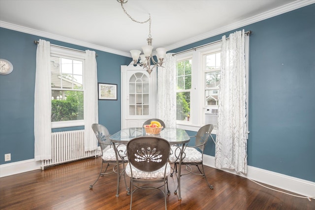 3665 Lufberry Ave, Wantagh, NY 11793 - dining room featuring radiator, a chandelier, plenty of natural light, wood finished floors, and ornamental molding