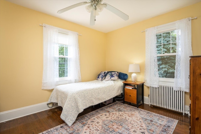 3665 Lufberry Ave, Wantagh, NY 11793 - bedroom featuring radiator, hardwood / wood-style flooring, and a ceiling fan