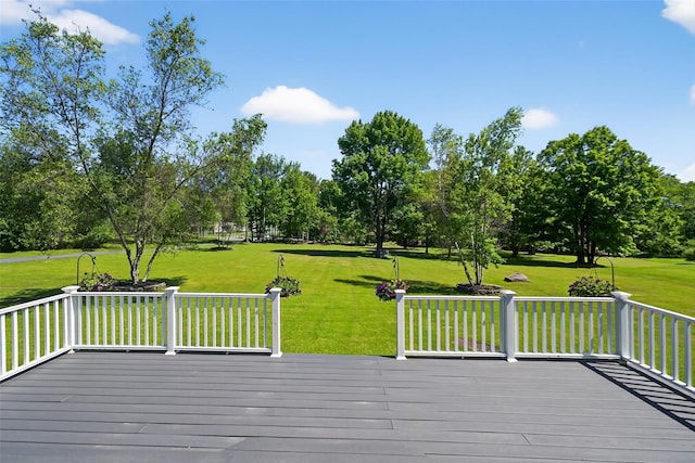 97 Pittaluga Dr, Monticello, NY 12701 - deck with a lawn and view of wooded area
