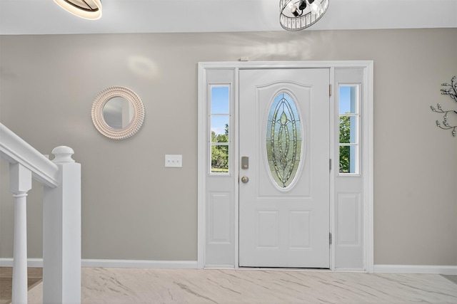 97 Pittaluga Dr, Monticello, NY 12701 - foyer entrance with stairs and marble finish flooring