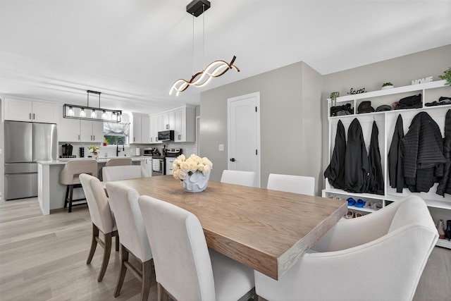 97 Pittaluga Dr, Monticello, NY 12701 - dining room featuring light wood finished floors