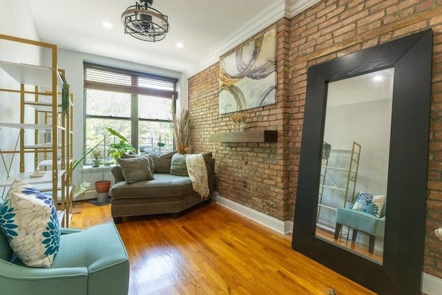 100 Ralph Ave Unit 2L, Brooklyn, NY 11221 - living room with brick wall and wood finished floors
