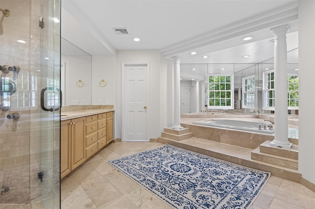 8 Danton Ln S, Locust Valley, NY 11560 - bathroom with decorative columns, vanity, a stall shower, a garden tub, and recessed lighting