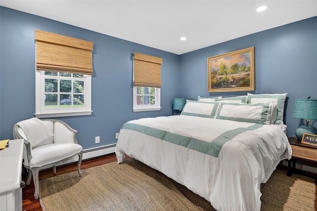 8 Danton Ln S, Locust Valley, NY 11560 - bedroom with wood finished floors, recessed lighting, and baseboard heating