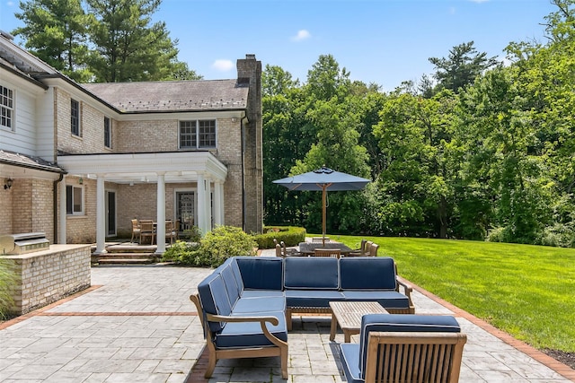 8 Danton Ln S, Locust Valley, NY 11560 - view of patio featuring an outdoor hangout area, exterior kitchen, and outdoor dining area