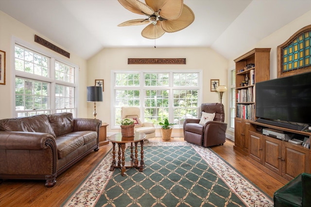 38 Mason Dr, Manhasset, NY 11030 - living room with lofted ceiling, a ceiling fan, and wood finished floors