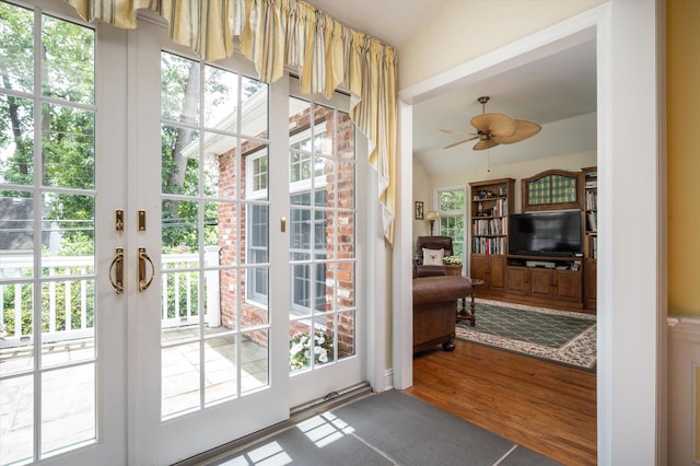 38 Mason Dr, Manhasset, NY 11030 - entryway featuring plenty of natural light, vaulted ceiling, ceiling fan, and wood finished floors