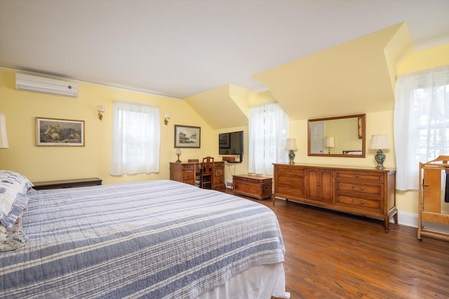 38 Mason Dr, Manhasset, NY 11030 - bedroom featuring a wall mounted air conditioner, dark wood-style floors, and lofted ceiling