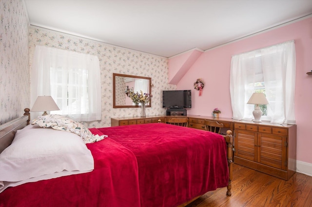 38 Mason Dr, Manhasset, NY 11030 - bedroom featuring wallpapered walls and wood finished floors