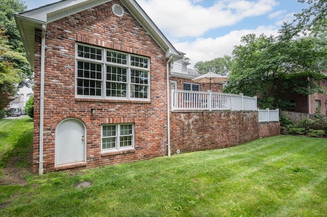 38 Mason Dr, Manhasset, NY 11030 - view of side of property featuring a yard and brick siding