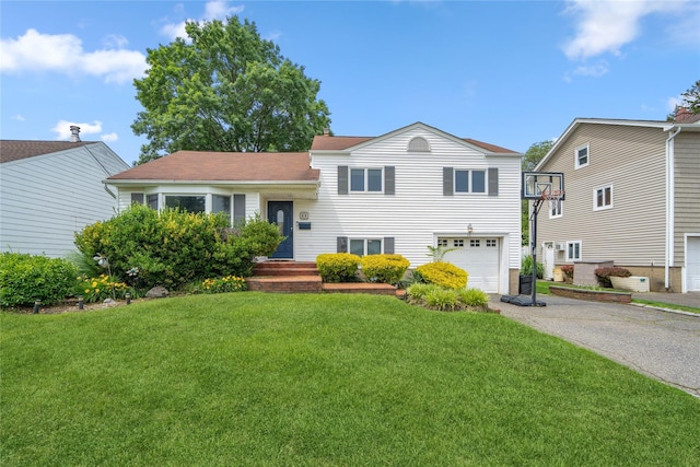 58 Circle Dr, Syosset, NY 11791 - split level home featuring a garage, asphalt driveway, and a front yard
