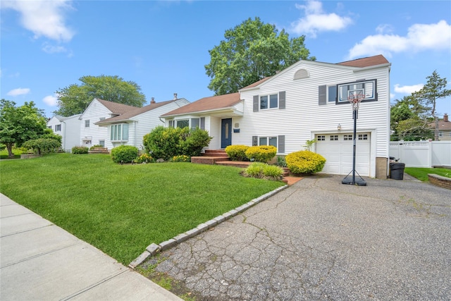 58 Circle Dr, Syosset, NY 11791 - split level home with an attached garage and driveway