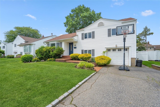58 Circle Dr, Syosset, NY 11791 - tri-level home with an attached garage and driveway