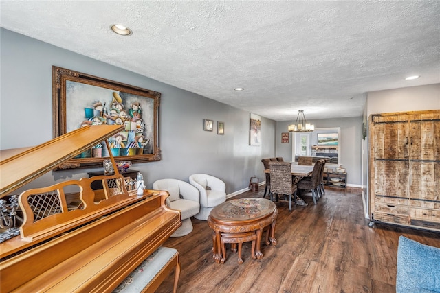 58 Circle Dr, Syosset, NY 11791 - living area with a chandelier, wood finished floors, a textured ceiling, and recessed lighting
