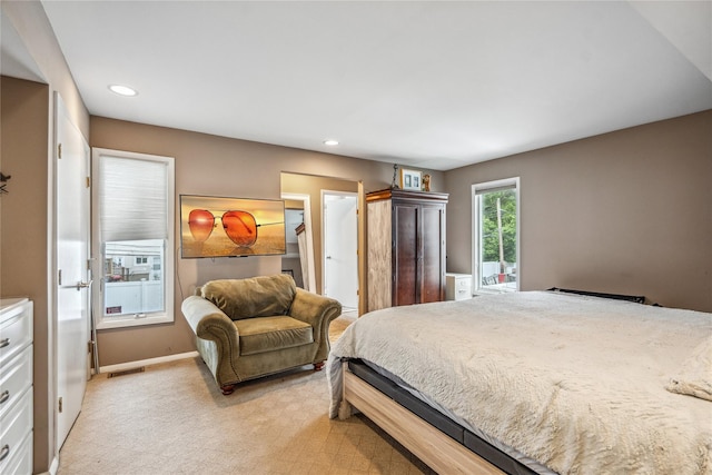 58 Circle Dr, Syosset, NY 11791 - bedroom with light carpet, recessed lighting, and a walk in closet