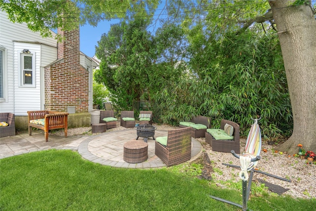 58 Circle Dr, Syosset, NY 11791 - view of patio / terrace featuring an outdoor living space with a fire pit