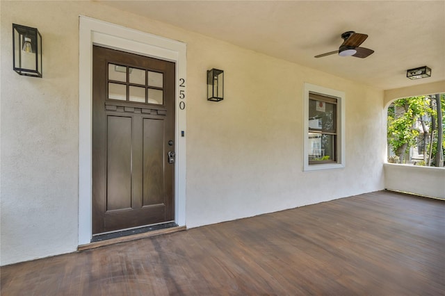 250 Cedar Hill Ave, Nyack, NY 10960 - doorway to property with a ceiling fan and stucco siding