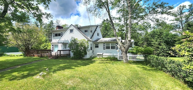 530 Sackett Lake Rd, Monticello, NY 12701 - rear view of property with a deck and a chimney