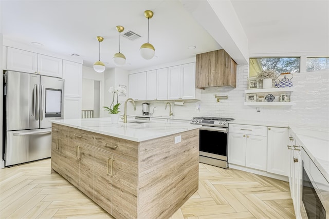 17 Onderdonk Rd, Suffern, NY 10901 - kitchen featuring appliances with stainless steel finishes, tasteful backsplash, light stone countertops, white cabinets, and recessed lighting