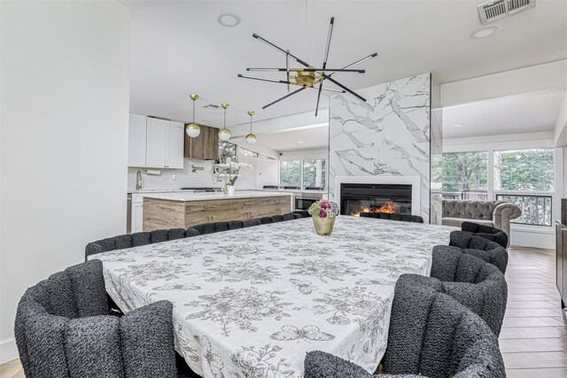 17 Onderdonk Rd, Suffern, NY 10901 - dining room with a chandelier and a premium fireplace